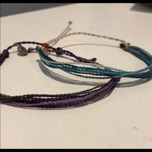 2 Pura Vita bracelets, blue and purple
